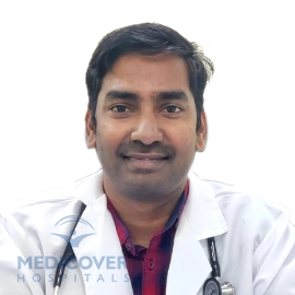 Dr Anil Kumar B